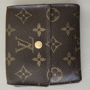 lv monogram dbl snap wallet 56